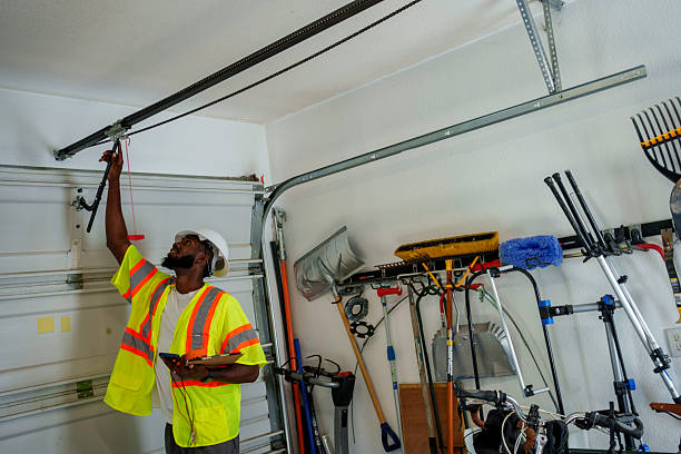 Professional Garage Door Panel Replacement technician working in Rising Sun, IN